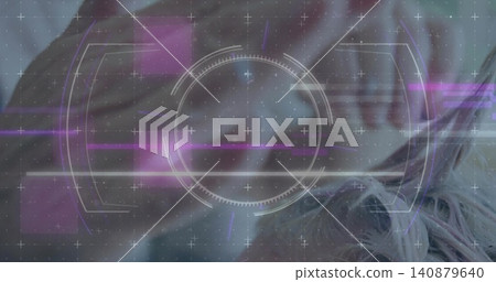 Displaying blurred female-presenting face floating in studio composite, with HUD reticle grid 140879640