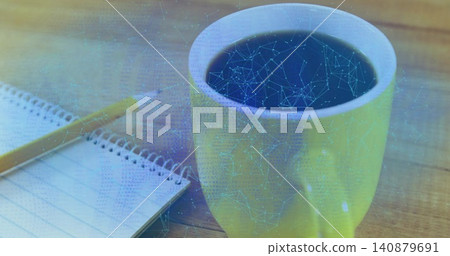 Showing yellow mug with black coffee on wooden desk, notebook, yellow pencil, blue network overlay Showing yellow mug with black coffee on wooden desk, notebook, yellow pencil, blue network overlay 140879691