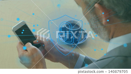 Tapping phone, businessman wearing gray suit at light wood table, coffee cup and security overlay Tapping phone, businessman wearing gray suit at light wood table, coffee cup and security overlay 140879705