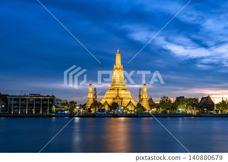 Pagoda at Wat Arun, a royal temple at Chaopraya river in the evening. Pagoda at Wat Arun, a royal temple at Chaopraya river in the evening. 140880679