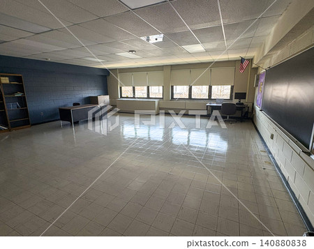 Empty Classroom With Windows and Blackboard in a High School Empty Classroom With Windows and Blackboard in a High School 140880838