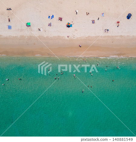 Aerial top view of summer activities on tropical beach landscape at Surin beach in Phuket, Thailand Aerial top view of summer activities on tropical beach landscape at Surin beach in Phuket, Thailand 140881549