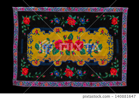 A colored rug with ethnic Slavic flowers like a template on a black background. 140881647