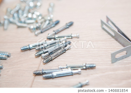set of Screws on the wooden background set of Screws on the wooden background 140881854