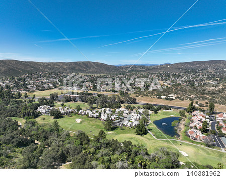 Aerial view of Ramona neighborhood with mountain, valley and golf course Aerial view of Ramona neighborhood with mountain, valley and golf course 140881962