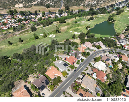 Aerial view of Ramona neighborhood with mountain, valley and golf course Aerial view of Ramona neighborhood with mountain, valley and golf course 140882050