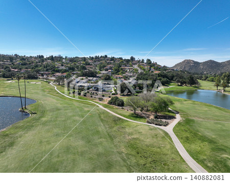 Aerial view of Ramona neighborhood with mountain, valley and golf course Aerial view of Ramona neighborhood with mountain, valley and golf course 140882081