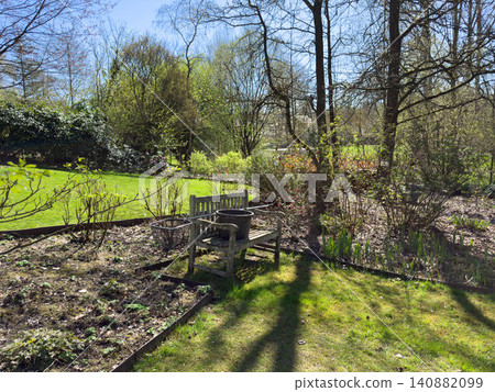 Enlgish green garden with multpiple type of trees and plants Enlgish green garden with multpiple type of trees and plants 140882099