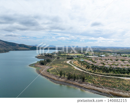 Aerial view Otay Lakes County Park in Chula Vista, California, a scenic view of a mountain range 140882215
