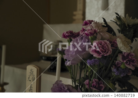 A cremated remains box placed on a Buddhist altar. A cremated remains box placed on a Buddhist altar. 140882719