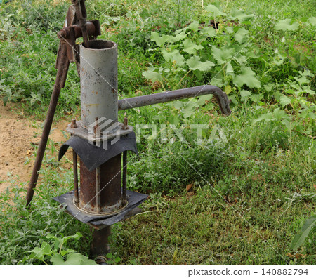 old rusty steel pipe in a garden 140882794