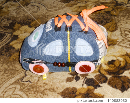 A sewed-out toy car. Stuffed Toys A sewed-out toy car. Stuffed Toys 140882980