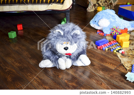 Toy shaggy gray wolf. Toy shaggy gray wolf. 140882993
