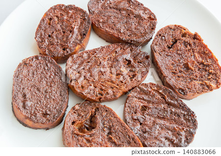 Homemade, delicious chocolate rusks placed on a white plate for a photo shoot (21) Homemade, delicious chocolate rusks placed on a white plate for a photo shoot (21) 140883066