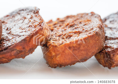 A close-up shot of delicious homemade chocolate rusks against a white background (11) A close-up shot of delicious homemade chocolate rusks against a white background (11) 140883078