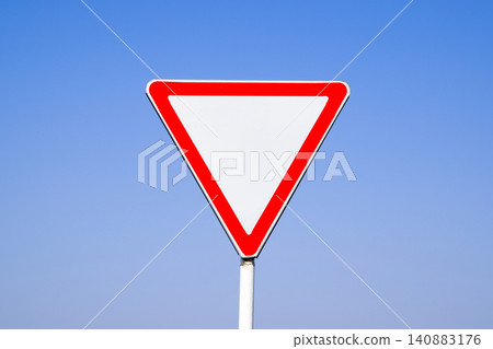 Road signs, give way. Sign on a blue background Road signs, give way. Sign on a blue background 140883176