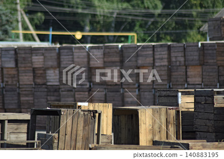 Wooden boxes stacked together 140883195