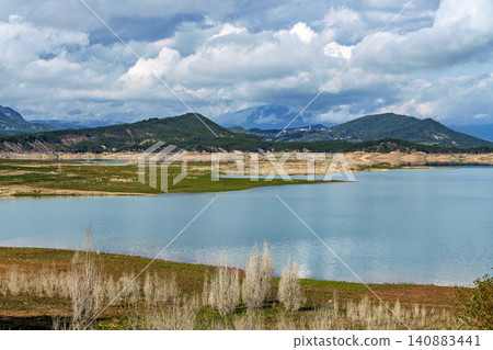 Beautiful panoramic view of the Mediano reservoir with the Pyrenees. Huesca, Aragon, Spain Beautiful panoramic view of the Mediano reservoir with the Pyrenees. Huesca, Aragon, Spain 140883441