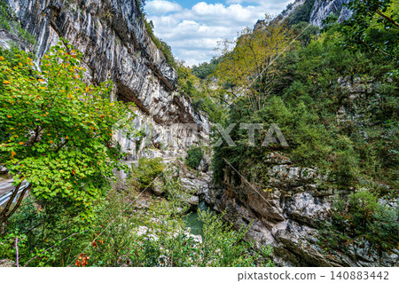 Walking through the Anisclo Canyon in Spain. One of the most spectacular landscapes in Aragon, Pyrenees in Spain Walking through the Anisclo Canyon in Spain. One of the most spectacular landscapes in Aragon, Pyrenees in Spain 140883442