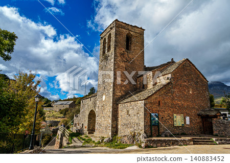 The Main Facade of the Church of San Martin de Tella in Tella, Huesca, Aragon, Spain. The Main Facade of the Church of San Martin de Tella in Tella, Huesca, Aragon, Spain. 140883452