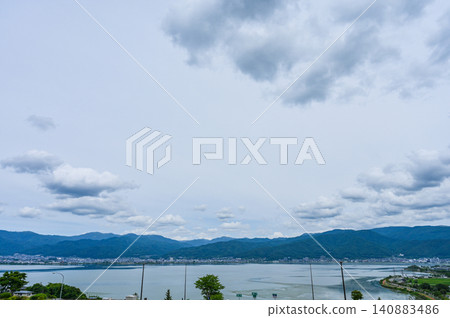 Lake Suwa as seen from the Suwa Lake Service Area in Nagano Prefecture Lake Suwa as seen from the Suwa Lake Service Area in Nagano Prefecture 140883486
