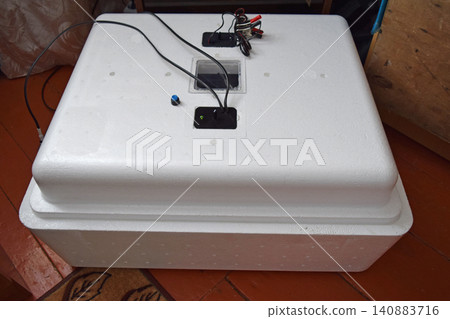 Incubator for a conclusion of chickens, ducklings Incubator for a conclusion of chickens, ducklings 140883716