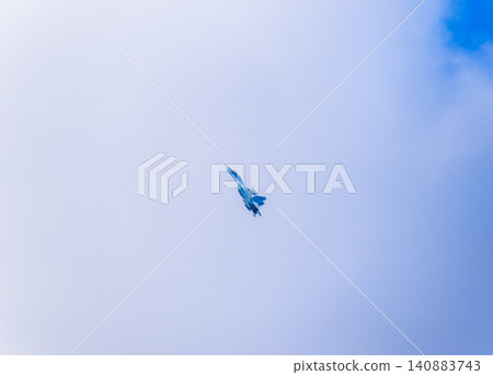 fighter flying in the sky. Military aircraft of the 4th generation 140883743