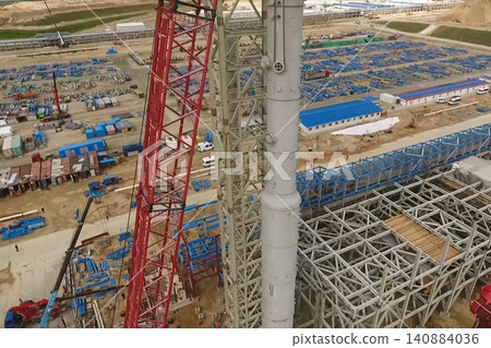 Installation of distillation column at an oil refinery. Installation of distillation column at an oil refinery. 140884036