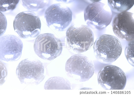 White, sparkling glass beads White, sparkling glass beads 140886105