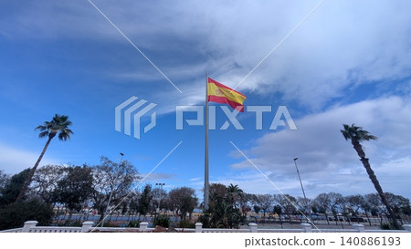 Flag of Spain waving in the wind on a background of blue sky Flag of Spain waving in the wind on a background of blue sky 140886193
