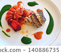High-end French cuisine featuring lobster and fish dishes 140886735