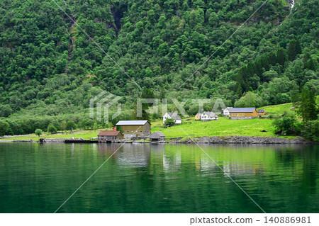 Houses in small settlements in the valleys of the magnificent Norwegian fjords Houses in small settlements in the valleys of the magnificent Norwegian fjords 140886981