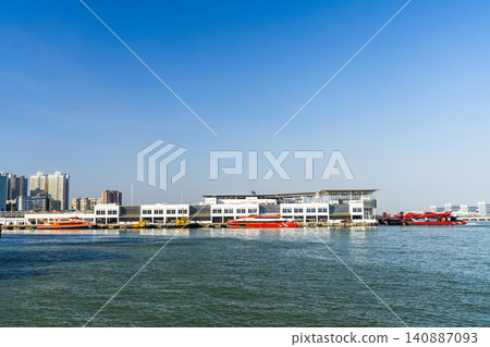 View of the Outer Harbour Ferry Terminal building in Macau, China. It provides ferry services to Hong Kong. View of the Outer Harbour Ferry Terminal building in Macau, China. It provides ferry services to Hong Kong. 140887093