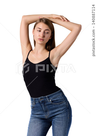Slavic beauty in black top posing confidently Slavic beauty in black top posing confidently 140887114