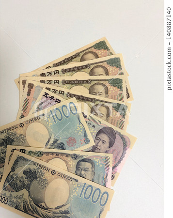 Japanese banknotes spread out in a fan shape Japanese banknotes spread out in a fan shape 140887140