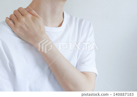 A woman who is concerned about shoulder pain A woman who is concerned about shoulder pain 140887183