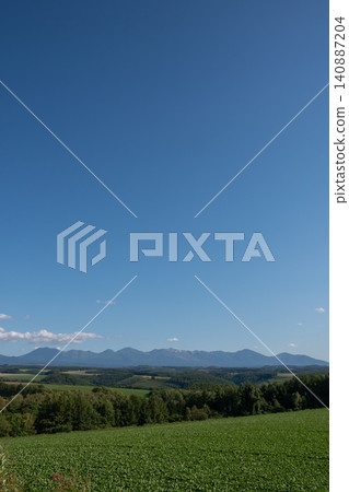 Summer blue sky and mountain ranges - Tokachi mountain range Summer blue sky and mountain ranges - Tokachi mountain range 140887204
