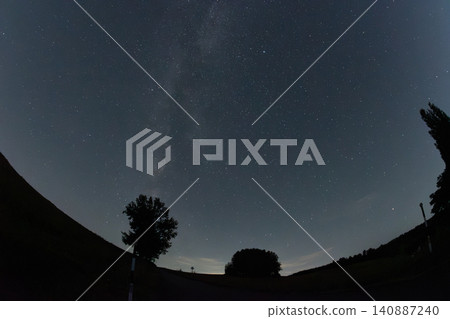 Silhouette of trees and starry sky galaxy Silhouette of trees and starry sky galaxy 140887240
