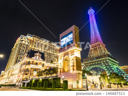 Beautiful night view of the Eiffel Tower at Parisian Macao is a casino resort on the Cotai Strip in Macau, China, owned by Las Vegas Sands. 140887311
