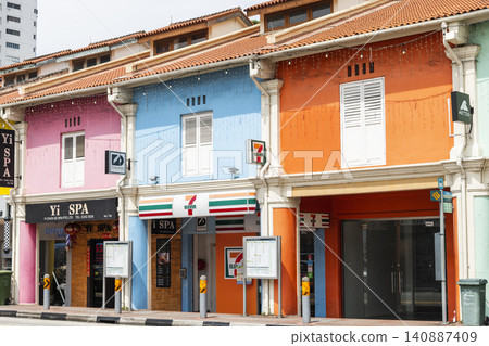 Close-up of the traditional shophouses in Kampong Glam, Singapore. There are many exotic Middle Eastern restaurants and homeware shops here. Close-up of the traditional shophouses in Kampong Glam, Singapore. There are many exotic Middle Eastern restaurants and homeware shops here. 140887409