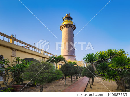 Panoramic View of Dai Lanh Lighthouse with Path Palm Trees and Tropical Landscape Vietnam Panoramic View of Dai Lanh Lighthouse with Path Palm Trees and Tropical Landscape Vietnam 140887785