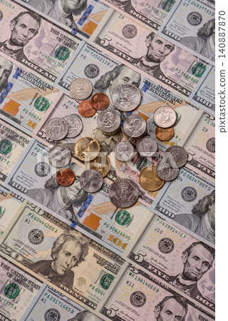 Paper US dollar bills of various denominations and cent coins as a business tool. Cash US dollars Paper US dollar bills of various denominations and cent coins as a business tool. Cash US dollars 140887870