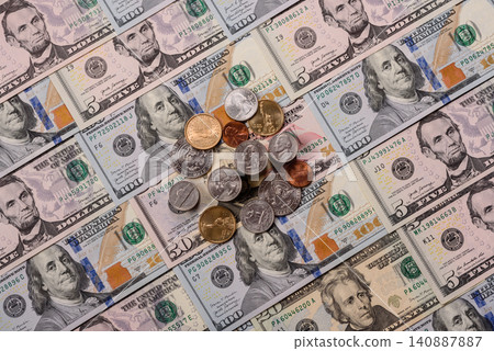 Paper US dollar bills of various denominations and cent coins as a business tool. Cash US dollars Paper US dollar bills of various denominations and cent coins as a business tool. Cash US dollars 140887887