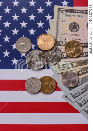 Paper US dollar bills of various denominations and cent coins as a business tool. Cash US dollars Paper US dollar bills of various denominations and cent coins as a business tool. Cash US dollars 140887938