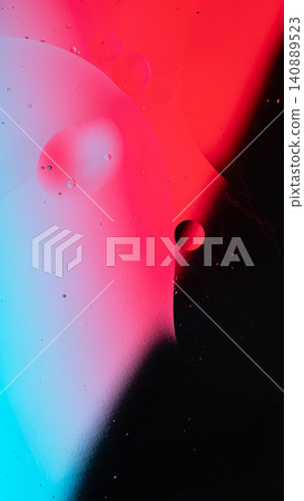 Oil and water creating abstract patterns, shapes, and colorful bubbles on a gradient background Oil and water creating abstract patterns, shapes, and colorful bubbles on a gradient background 140889523