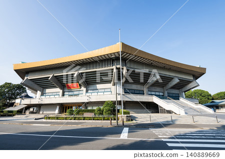 Building view of the Nippon Budokan, it is an indoor arena in Kitanomaru Park, Chiyoda, Tokyo, Japan. 140889669