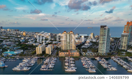 Luxury boat harbor. Marina in Miami Beach, Florida USA. Yacht boat docked on sea Biscayne bay. Downtown Miami Marina with luxury yacht boat. Summer vacation. Luxurious yacht marina Luxury boat harbor. Marina in Miami Beach, Florida USA. Yacht boat docked on sea Biscayne bay. Downtown Miami Marina with luxury yacht boat. Summer vacation. Luxurious yacht marina 140889799