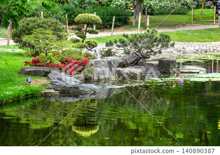 Scenic landscape view of Kyoto Garden in Holland Park, during a sunny spring day. Scenic landscape view of Kyoto Garden in Holland Park, during a sunny spring day. 140890387