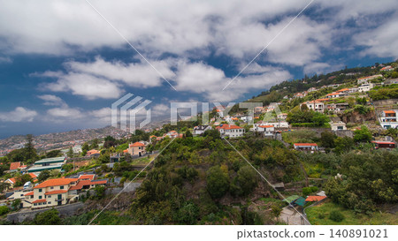 View from the mountain over the rooftops from cable car on Madeira timelapse hyperlapse. View from the mountain over the rooftops from cable car on Madeira timelapse hyperlapse. 140891021