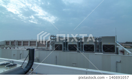System of industrial central conditioning set on the roof of the building day to night timelapse System of industrial central conditioning set on the roof of the building day to night timelapse 140891057